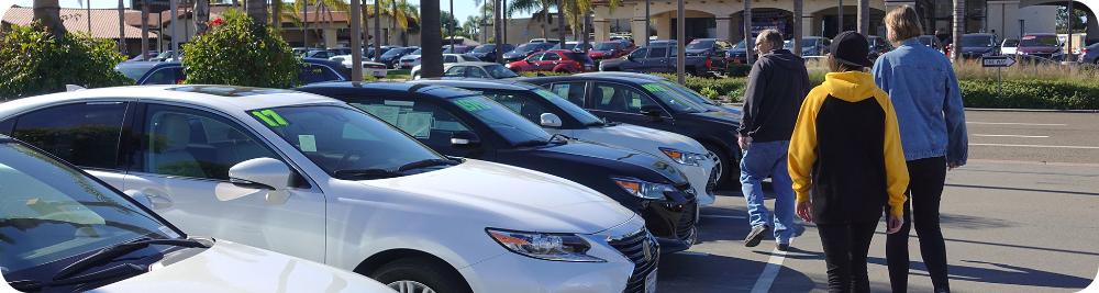 customers at an outdoor car lot