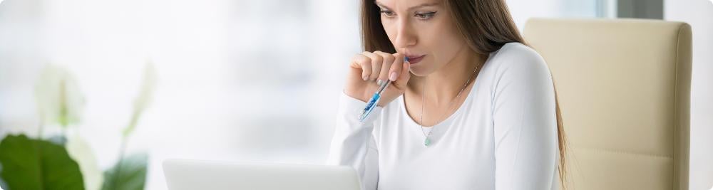 woman viewing credit report on computer